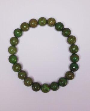 ade gemstone bead bracelet showing natural color variations and polish