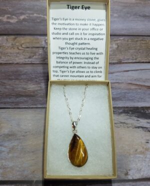 Tiger Eye teardrop sterling silver pendant showing golden chatoyancy from South Africa