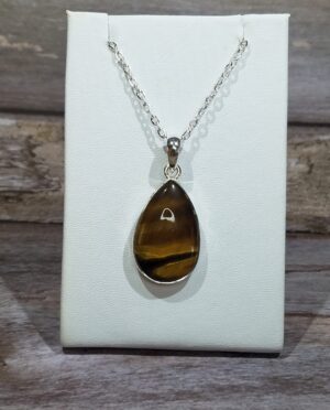 Tiger Eye tear drop sterling silver pendant showing golden chatoyancy from South Africa