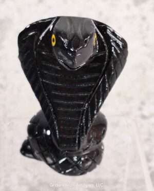 Hand-carved black onyx cobra figurine