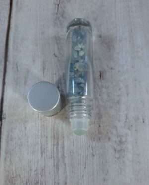 Aquamarine essential oil roller with gemstone infusion for aromatherapy
