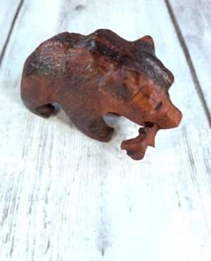 Hand-carved ironwood sculpture of bear with fish – Southwest folk art
