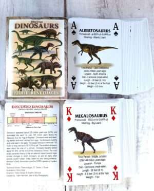 Illustrated dinosaur playing cards with T. rex, Stegosaurus, and Triceratops designs