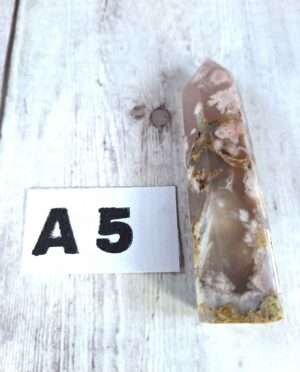 Flower Agate point with bloom-like crystal patterns