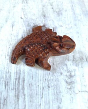 Hand-carved horny toad sculpture made from dense desert ironwood