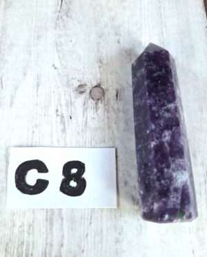 Lepidolite point with soft lavender hues and white streaks