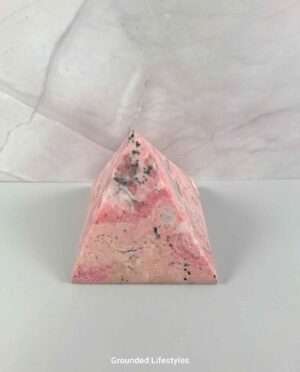 Rhodonite pyramid from Peru with pink and black patterns