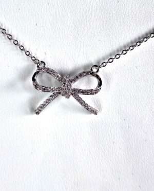 Ribbon cubic zirconia necklace, 0.75 inch plated pendant on 20 inch adjustable chain, sparkling symbolic jewelry with gift box by Grounded Lifestyles