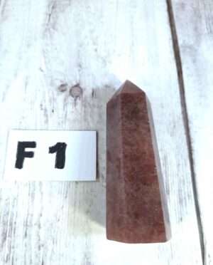 Strawberry Quartz point with pink and red hues