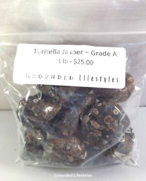 Turritella Jasper tumbled stones with visible fossil snail shells from Wyoming