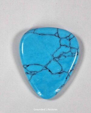Turkenite guitar pick showcasing unique mineral patterns