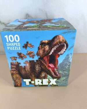 Cartoon-style T-Rex shaped puzzle with 100 pieces