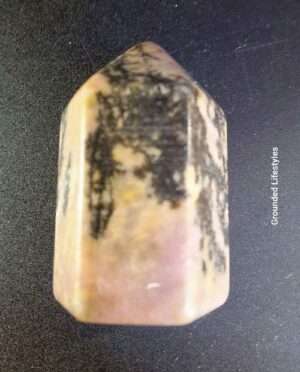 1-inch Rhodonite crystal tower with pink and black veining