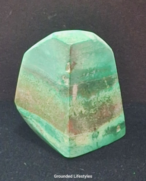 Variscite specimen from Morocco measuring 1.25 inches with green coloration.