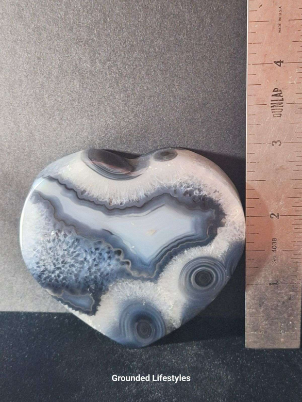3 inch A grade natural agate heart showing polished banded layers