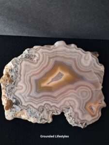 3.75 inch Laguna agate slice with pink and brown concentric banding