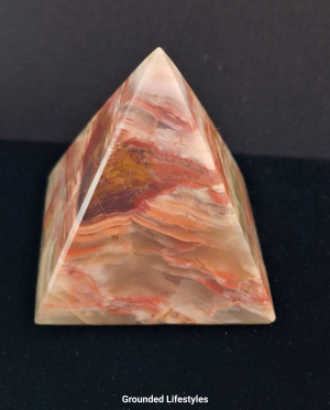 Polished green onyx pyramid 2.25 inches from Pakistan.
