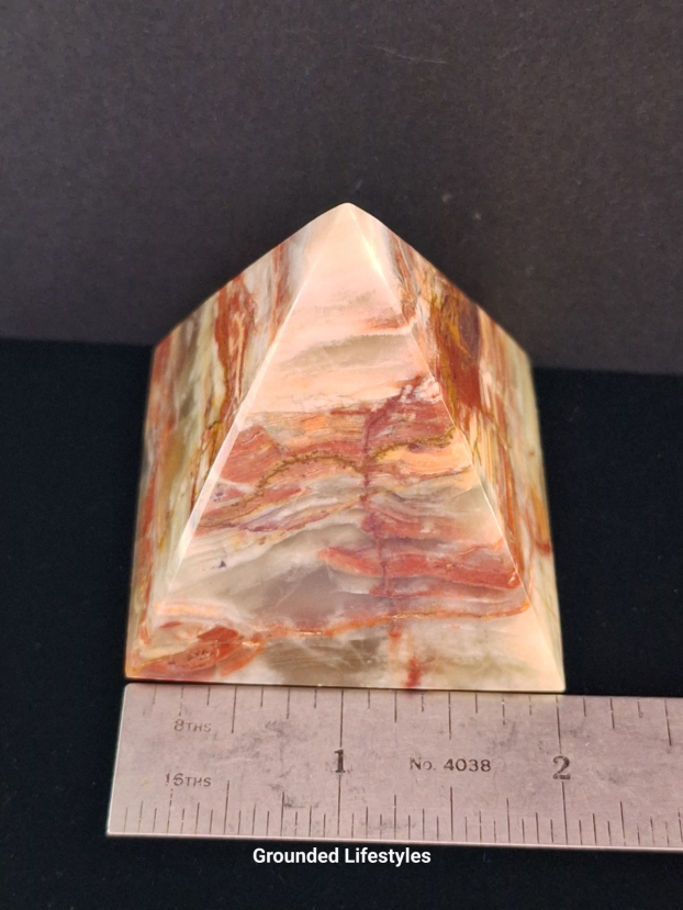 Polished green onyx pyramid 2.25 inches from Pakistan.