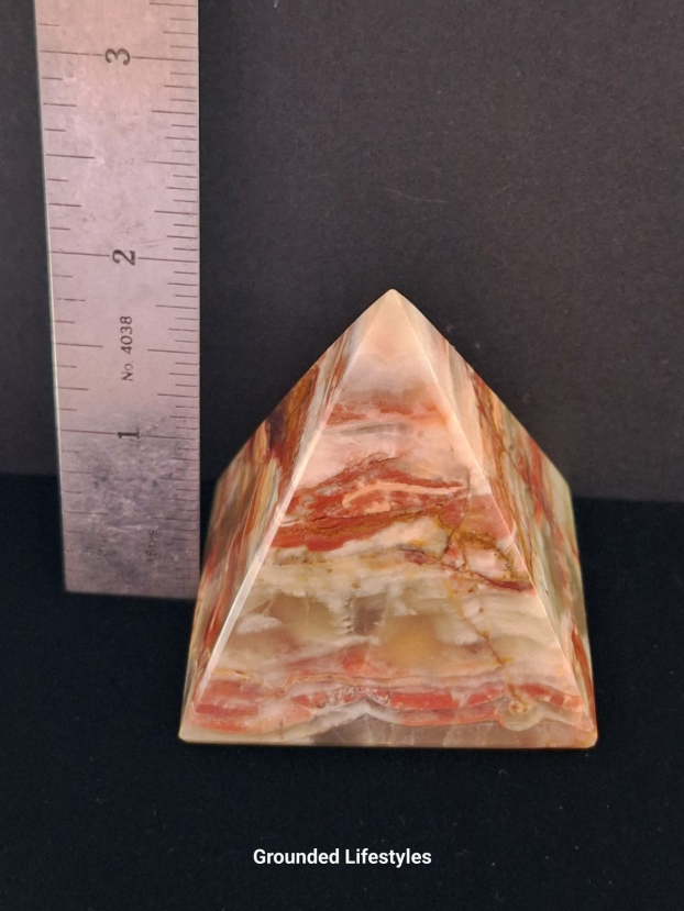 Polished green onyx pyramid 2.25 inches from Pakistan.