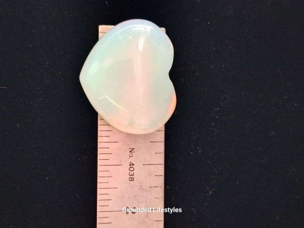 1 inch opalite heart crystal with soft blue glow