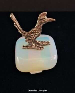 Hand-cast pewter roadrunner figurine on polished opalite base