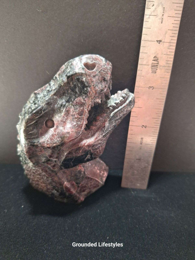 hand-carved garnet T-Rex dinosaur head 3 inch