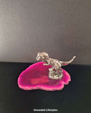 pewter T-Rex on pink agate slice decorative sculpture