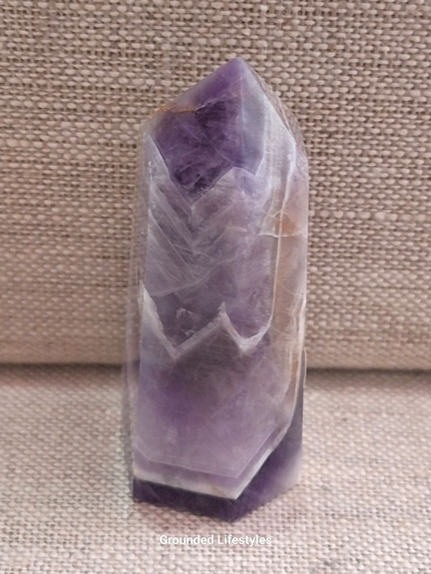 polished chevron amethyst 2.50 inch point showing V-shaped bands