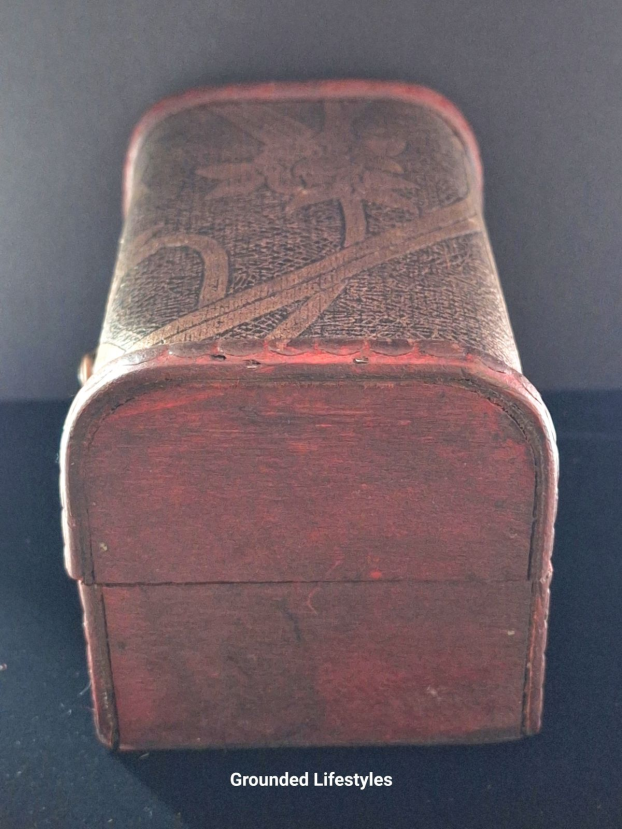 dinosaur skull high bounce balls shown in wooden treasure chest