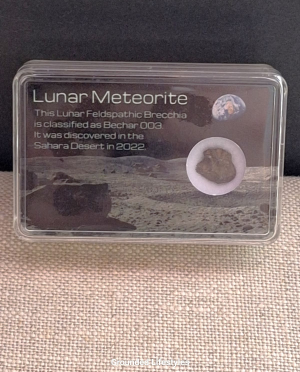 lunar meteorite Bechar 003 sample from Sahara Desert in display container