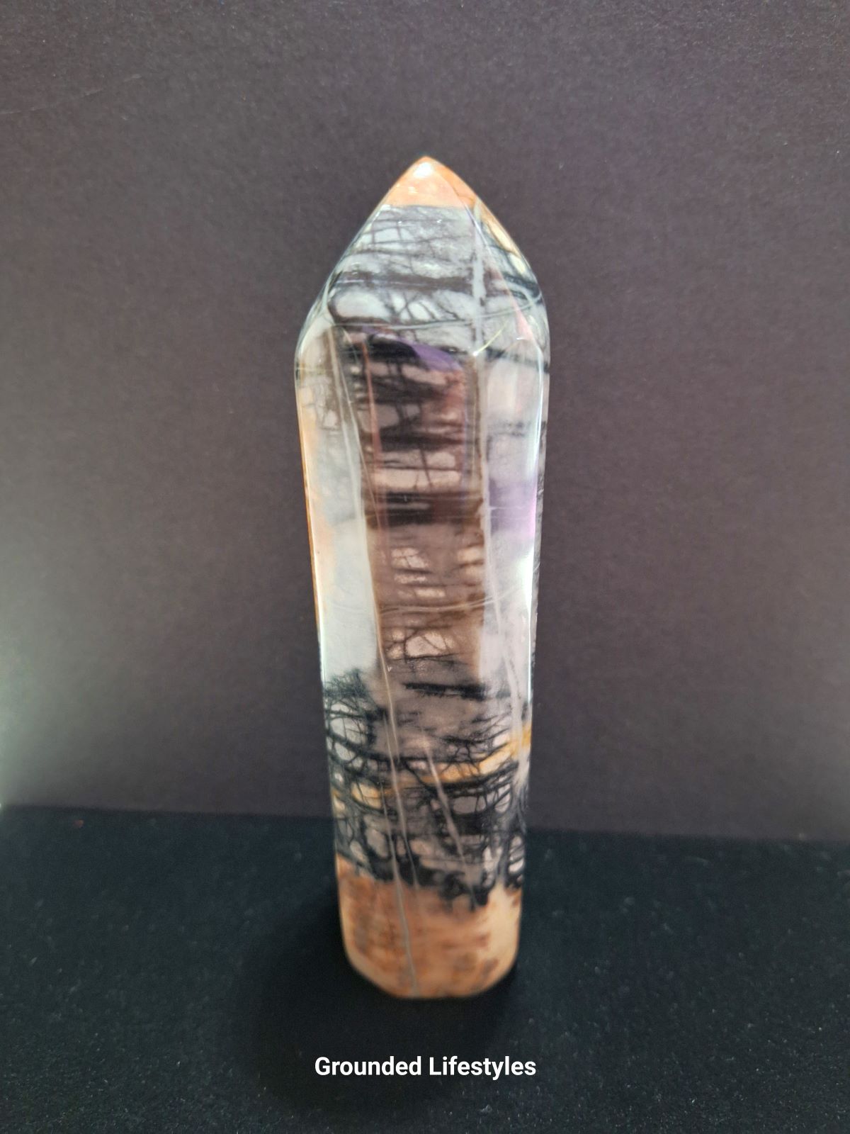 Hand-polished 5 inch Picasso Marble point from Utah.
