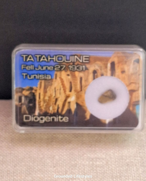 Tatahouine meteorite specimen from Tunisia in labeled display box