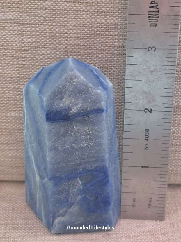 polished blue quartz point 3.25 inch showing natural banding