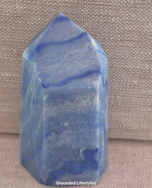 polished blue quartz point 3.25 inch showing natural banding