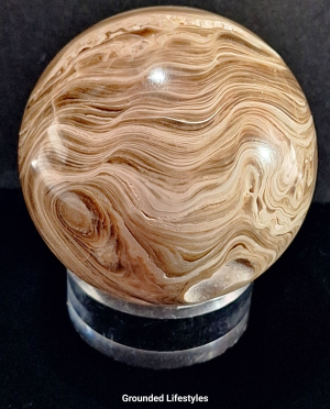 A grade brown calcite sphere 2 inch collector specimen