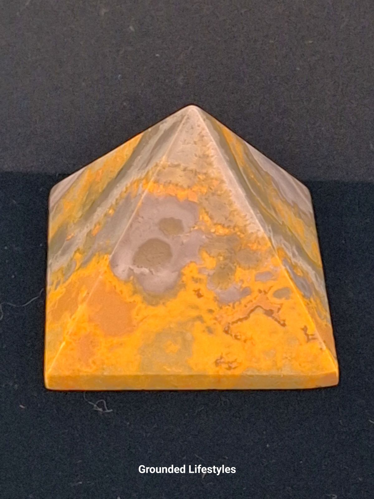 1.5 inch bumblebee jasper pyramid from Indonesia with yellow and black bands