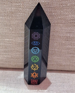 polished black obsidian chakra point 3.50 inch with colored engravings