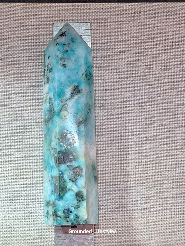 4 inch chrysocolla point showing blue and green copper mineral patterns