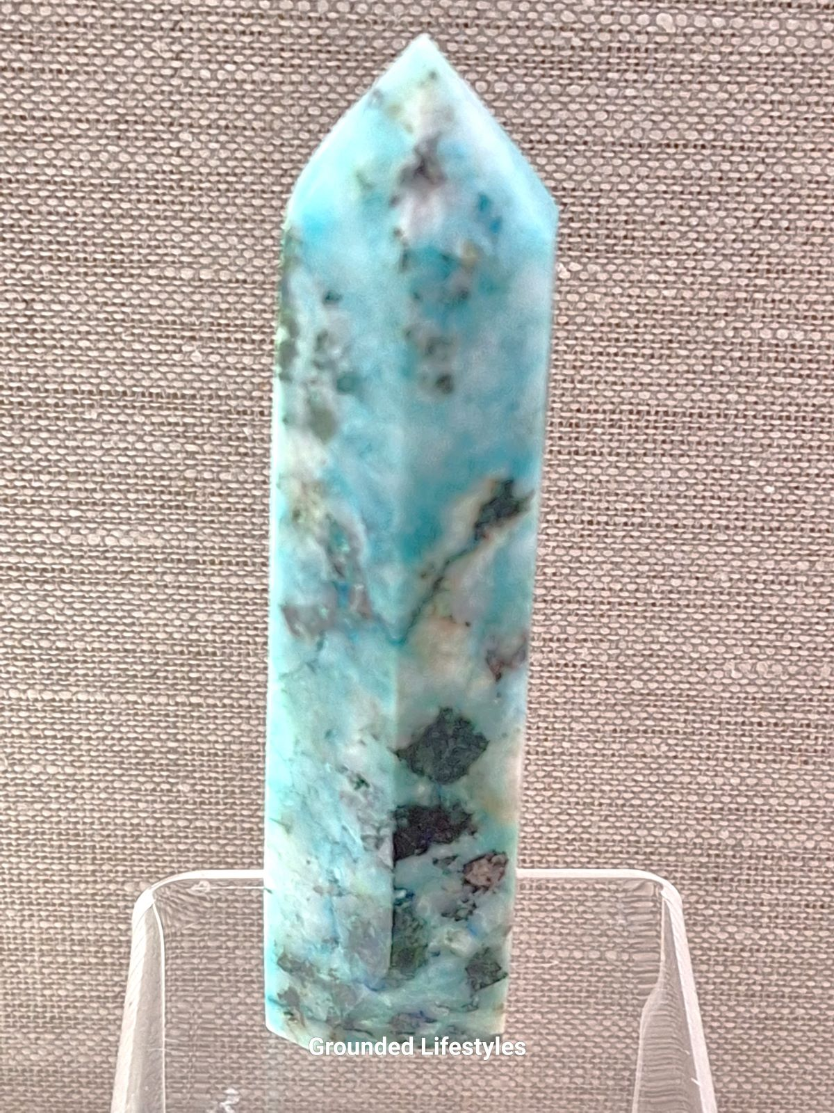 4 inch chrysocolla point showing blue and green copper mineral patterns