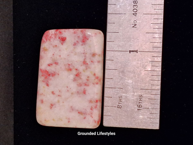 1 inch cinnabrite slice from Peru hand polished with pink and white tones