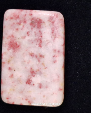 1 inch cinnabrite slice from Peru hand polished with pink and white tones