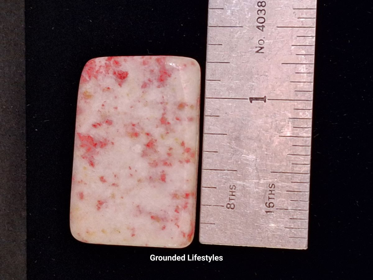 1 inch cinnabrite slice from Peru hand polished with pink and white tones