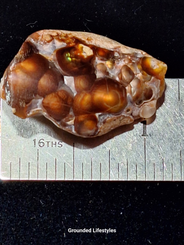 1 inch fire agate from Slaughter Mountain Arizona showing vivid iridescent layers