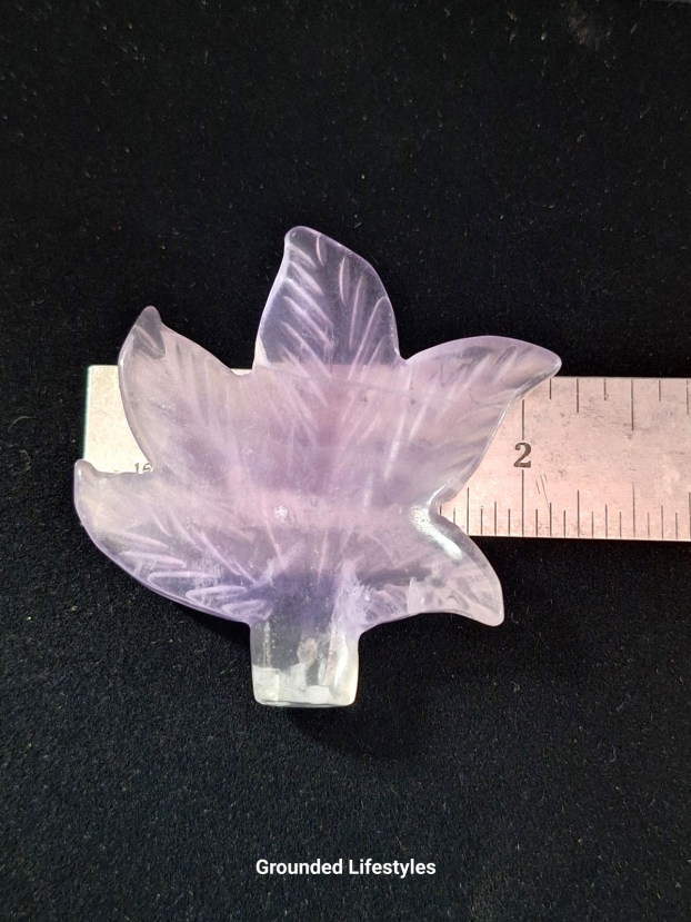 Polished purple fluorite gemstone leaf carving