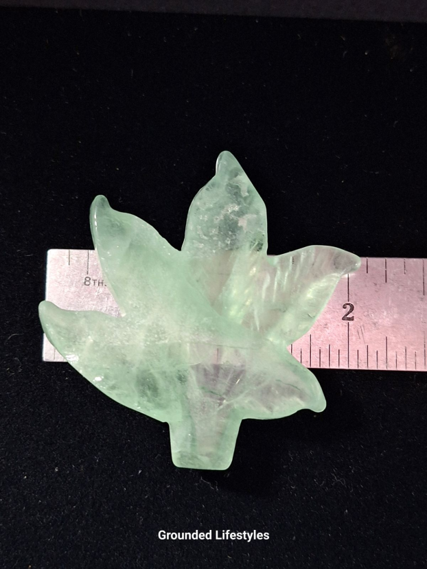 Polished green fluorite gemstone leaf carving