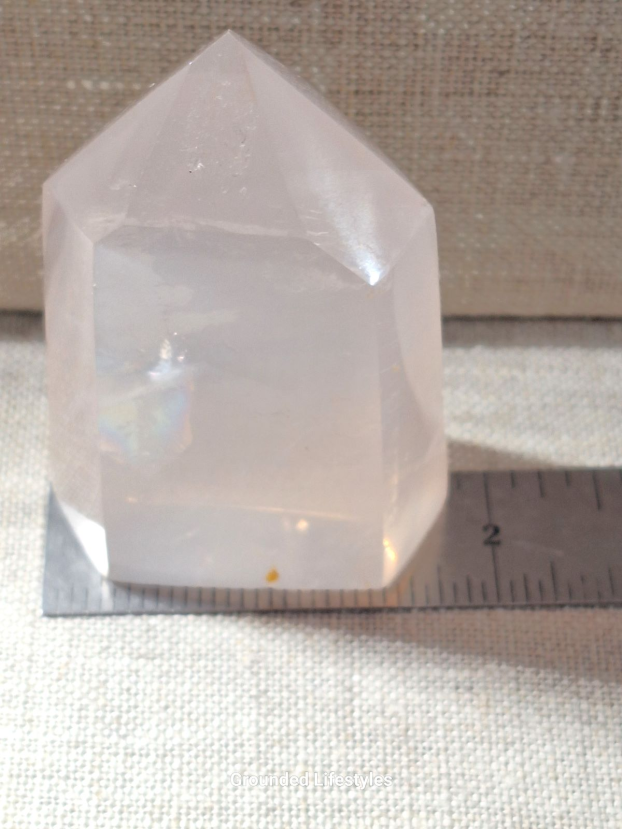 polished girasol quartz point 2.75 inch with soft pink glow
