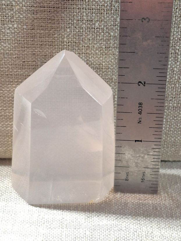 polished girasol quartz point 2.75 inch with soft pink glow
