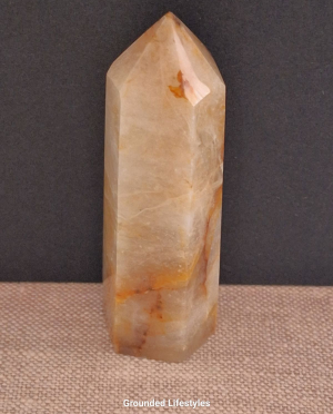 polished golden healer quartz point 3 inch showing iron inclusions