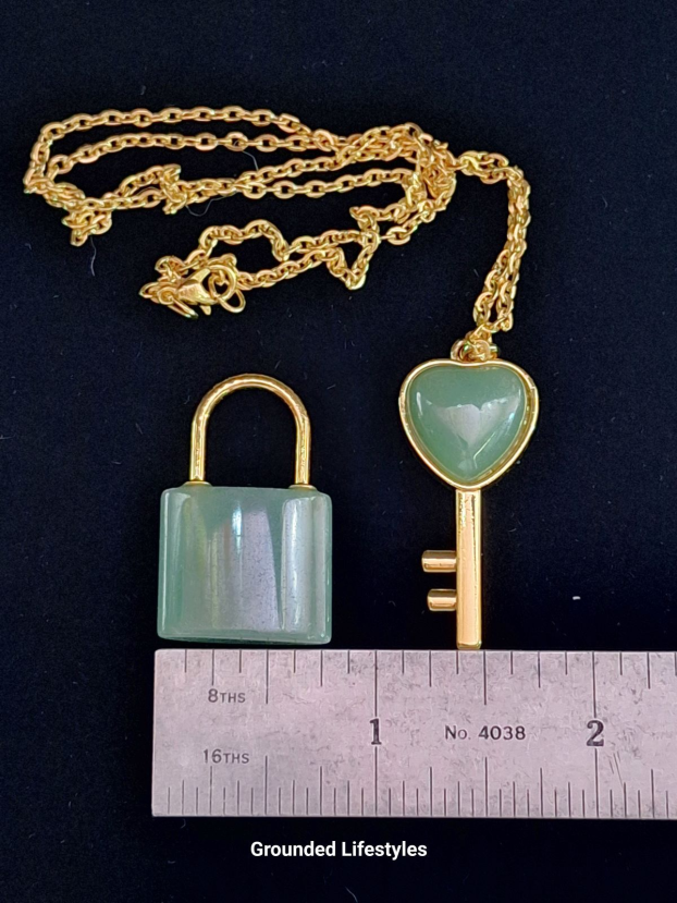 gold plated green aventurine key necklace shown in gift box