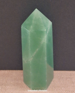 polished green aventurine point 2.75 inch showing quartz sparkle